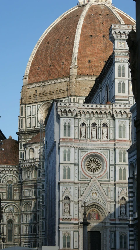 the dome and bell tops of this building are beautiful