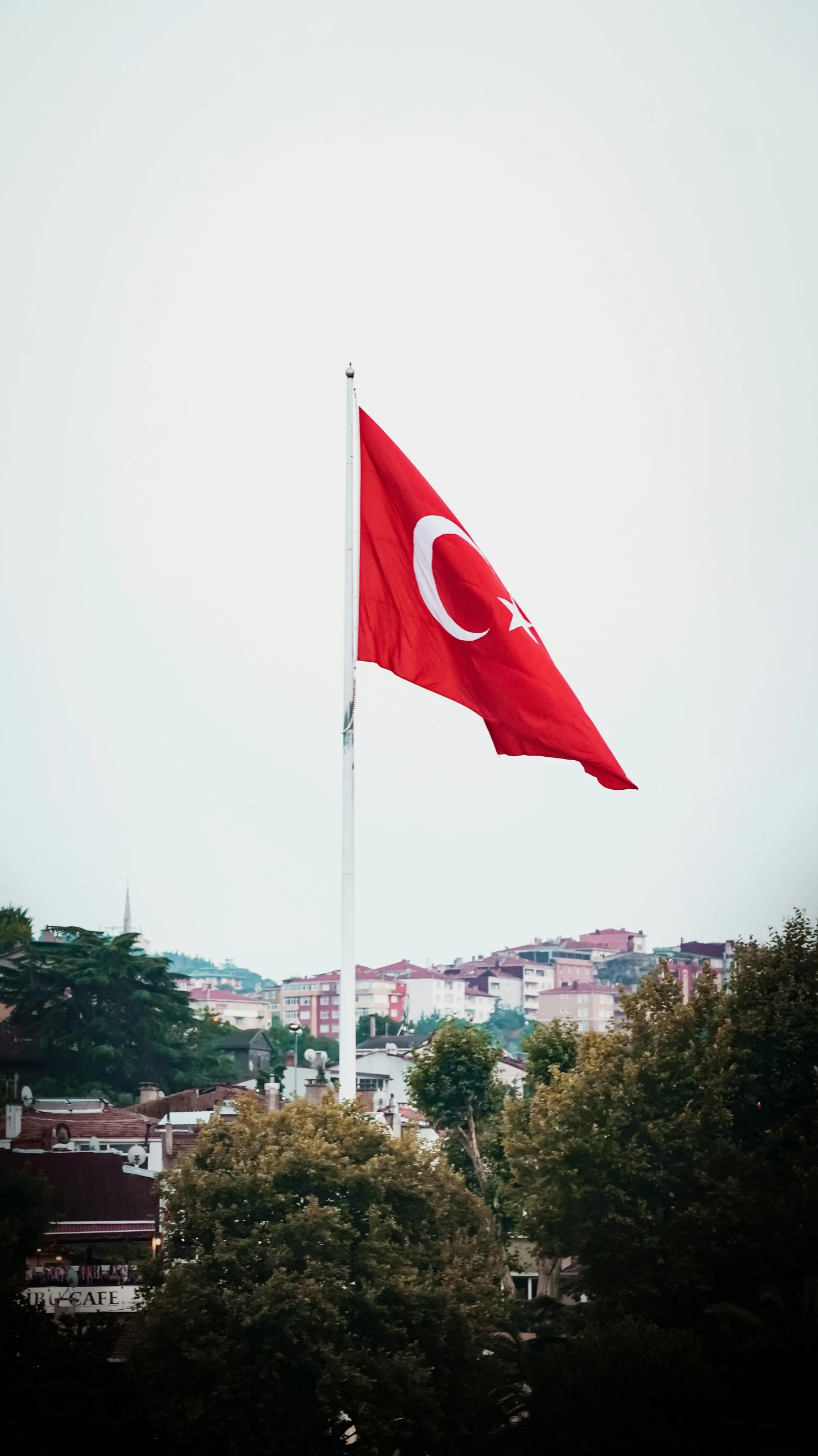 a flag that has been flown over a city