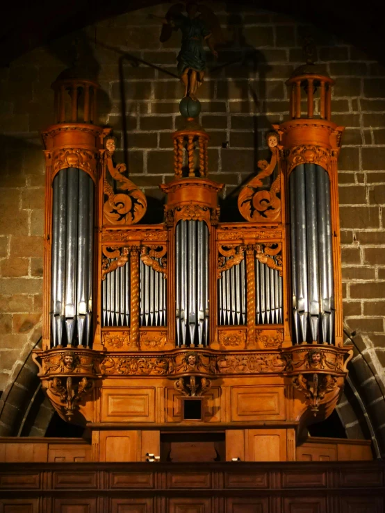 a pipe sitting at the top of a pew