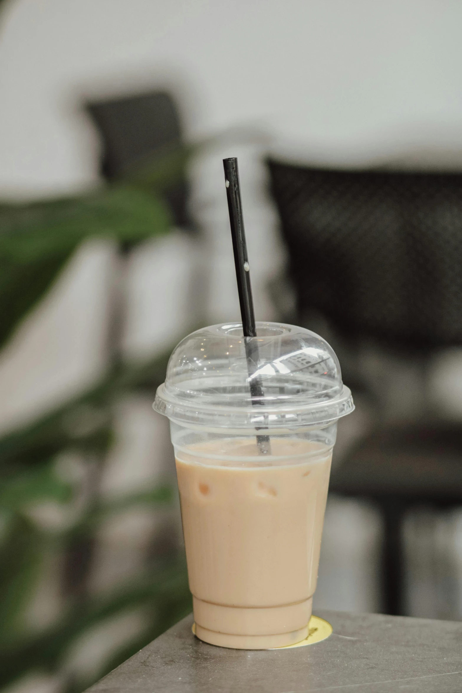 a iced coffee is sitting on top of a table