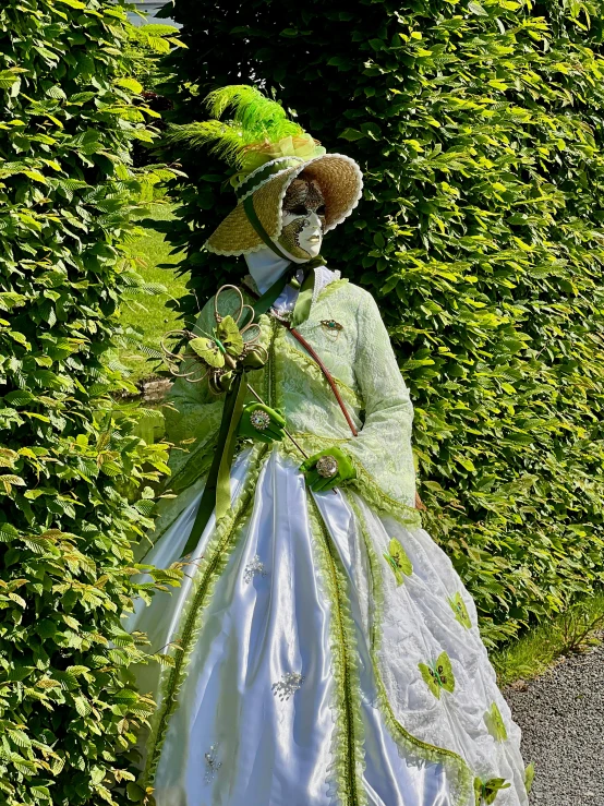 a scare is shown next to some shrubbery