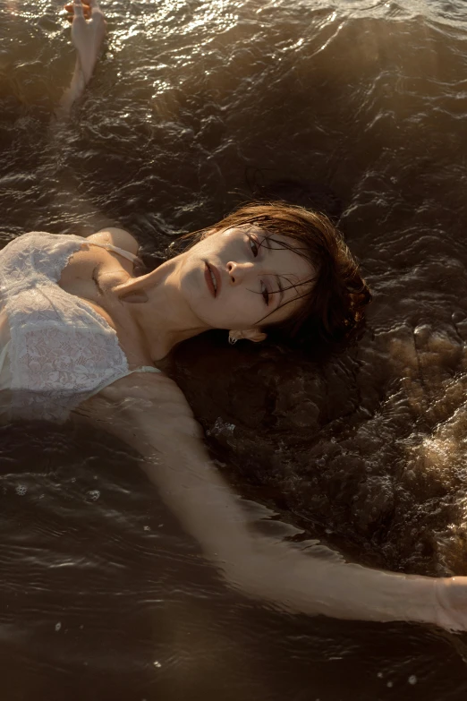 an image of a woman swimming in water