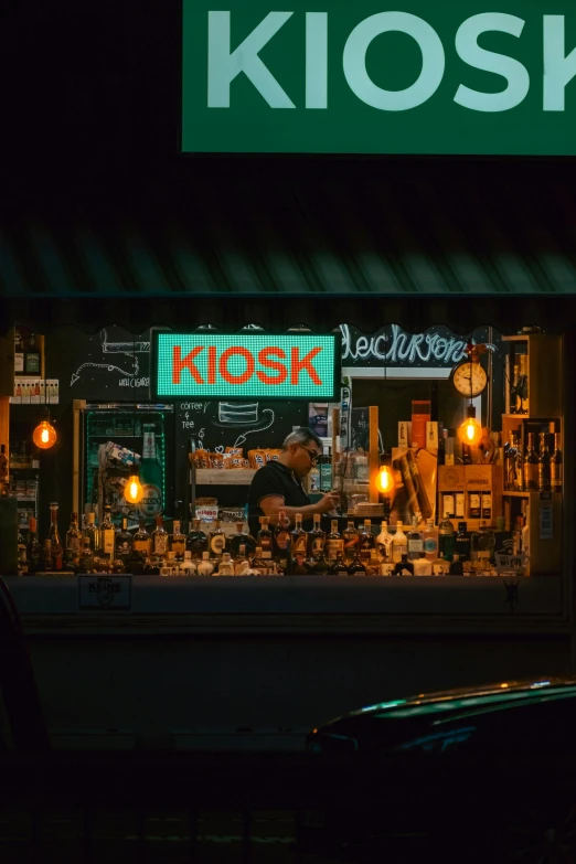 night view of store front with illuminated items