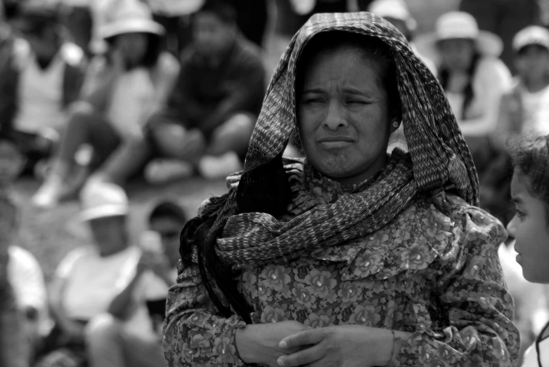 a woman that is sitting in the street