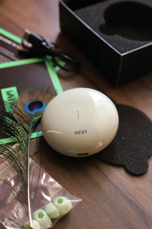 a white ball sits on top of a table