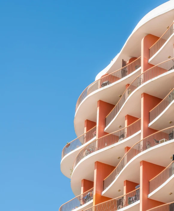 a tall building that has some balconies on it