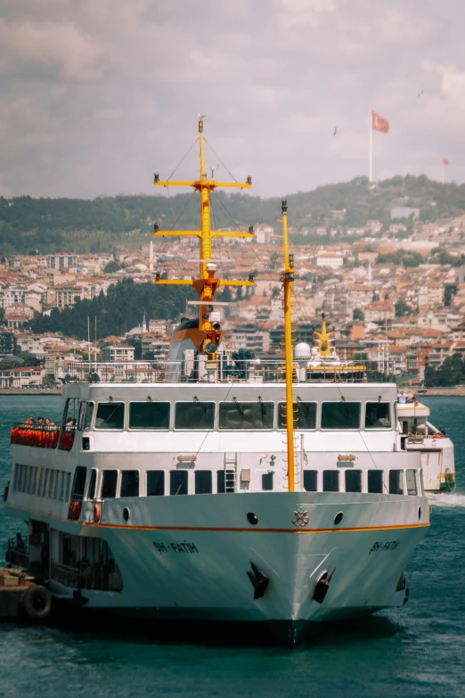 the large ship is going through the water by itself