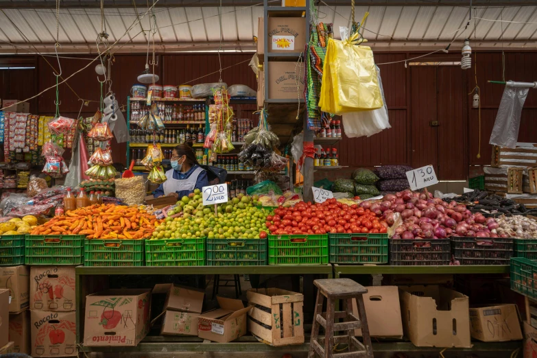 a view of a produce stand with fresh fruit on display