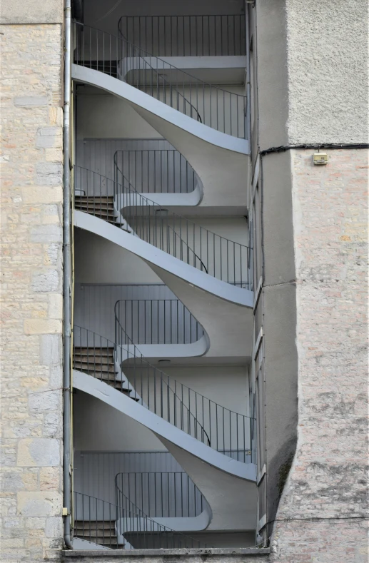 a group of steps up to the second floor of a building