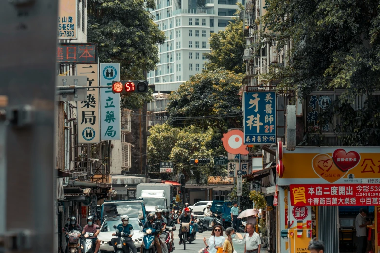 a city street with lots of tall buildings