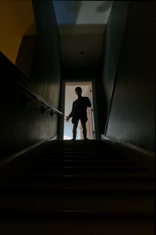 a man standing in a doorway on an elevator