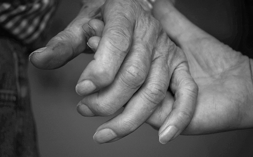 two hands on each other are seen together