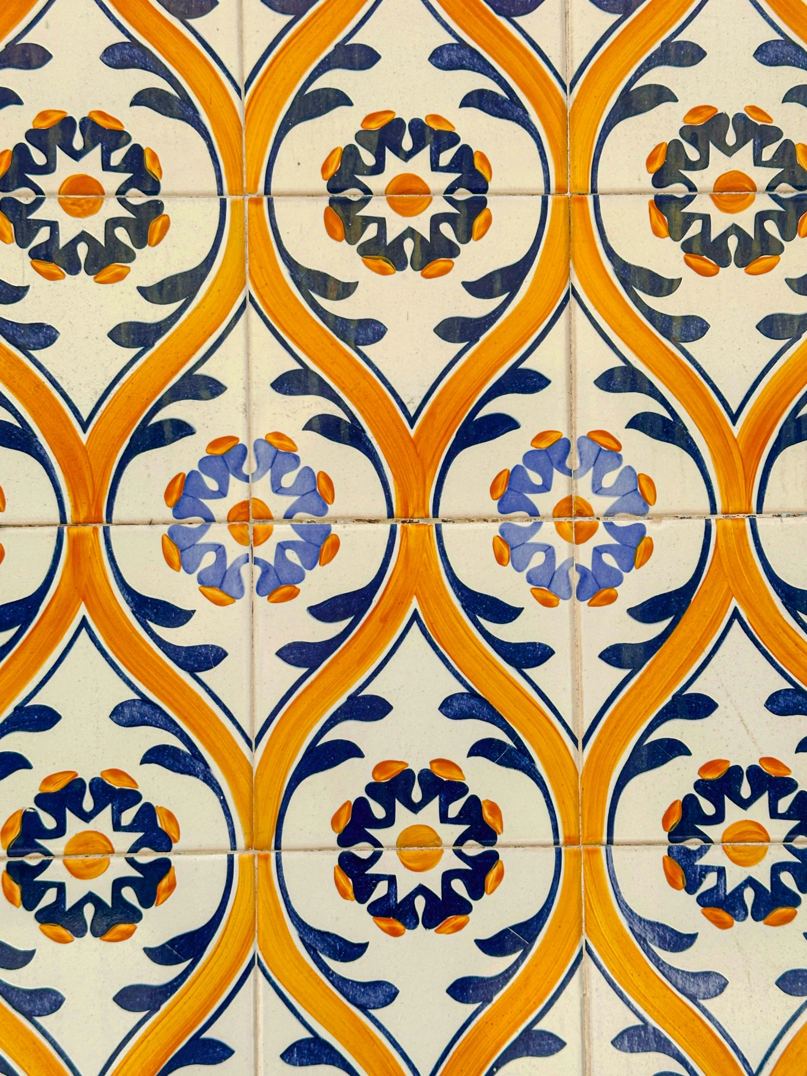 colorful pattern on an old antique tile