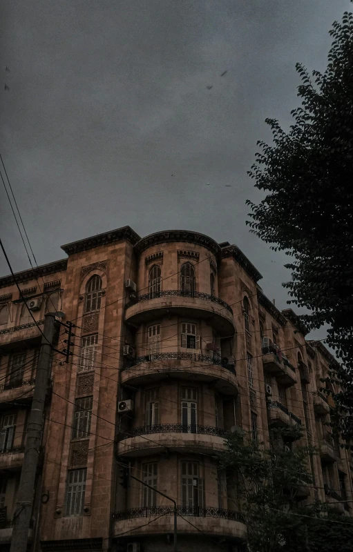 a large building with lots of windows and balconies