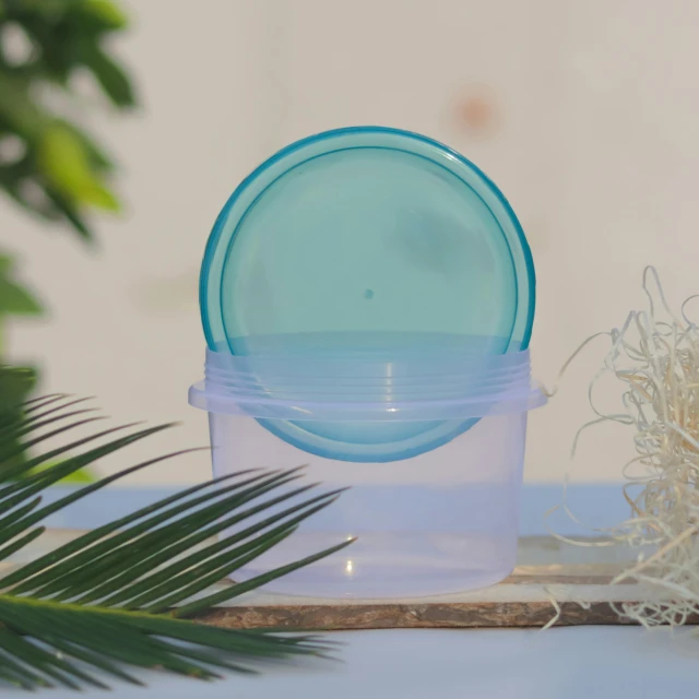 an empty blue plate sitting on a white tray