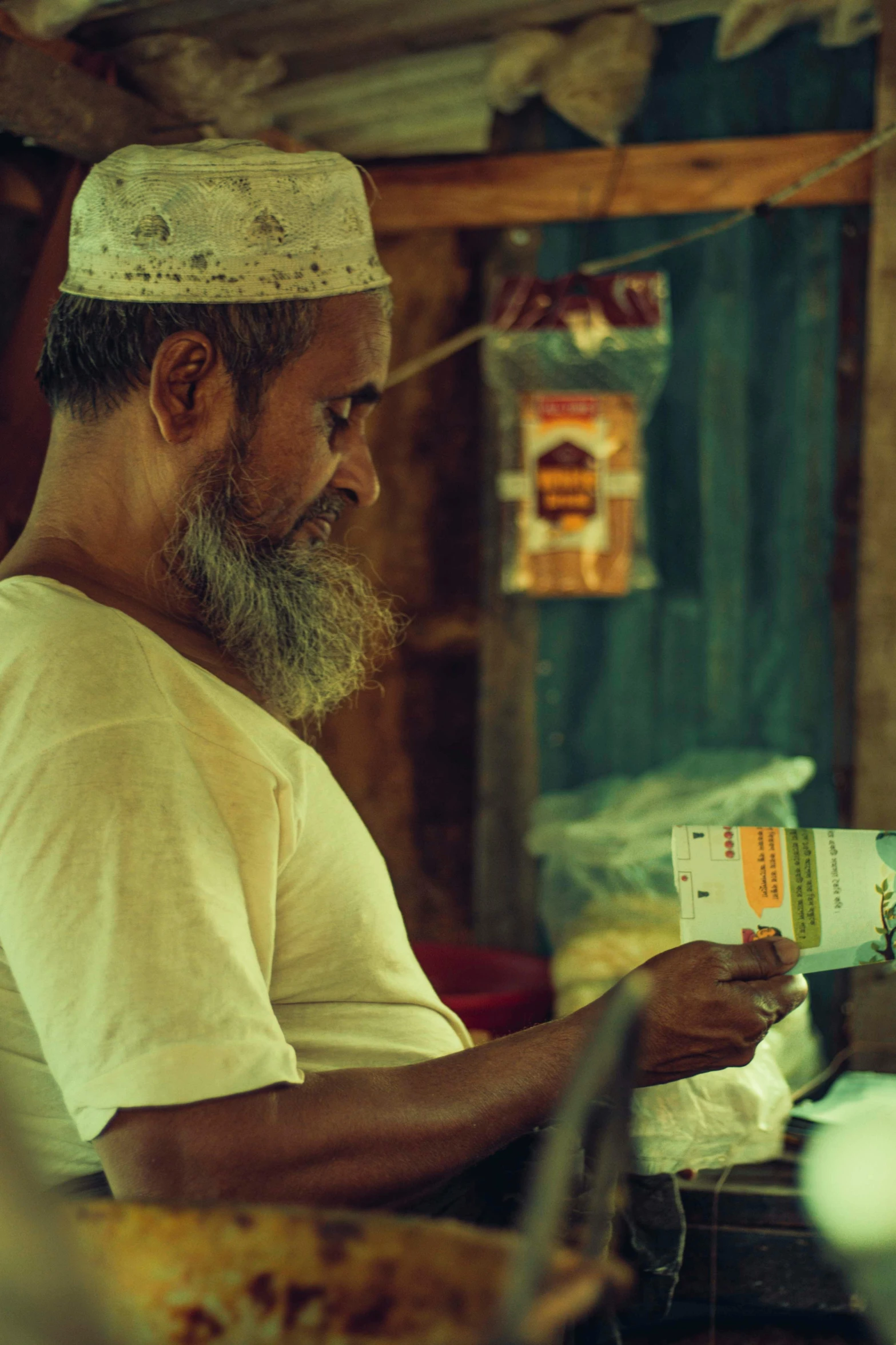 a man sitting at a table with food