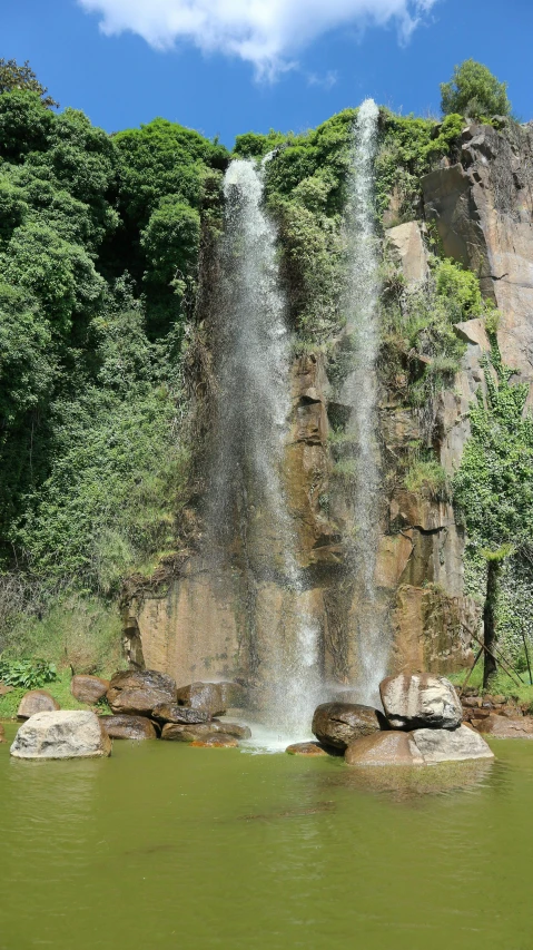 a waterfall that is falling down to the side