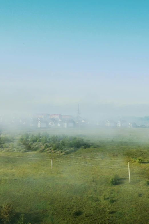 a tall green building in the distance