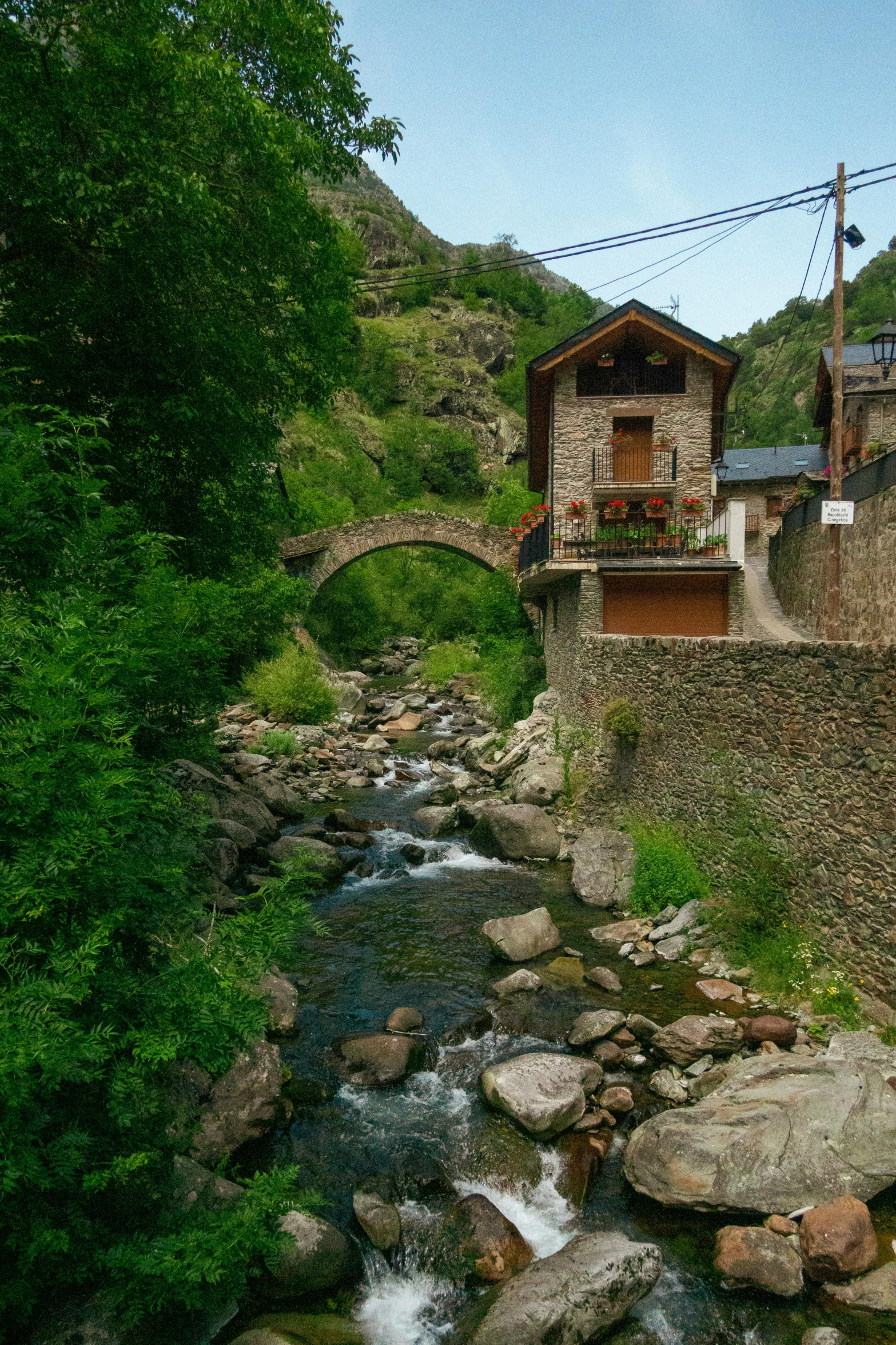 some very nice looking buildings and a stream