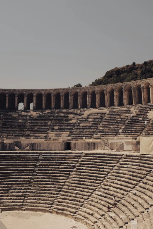 the interior of an old roman ampulee in a town