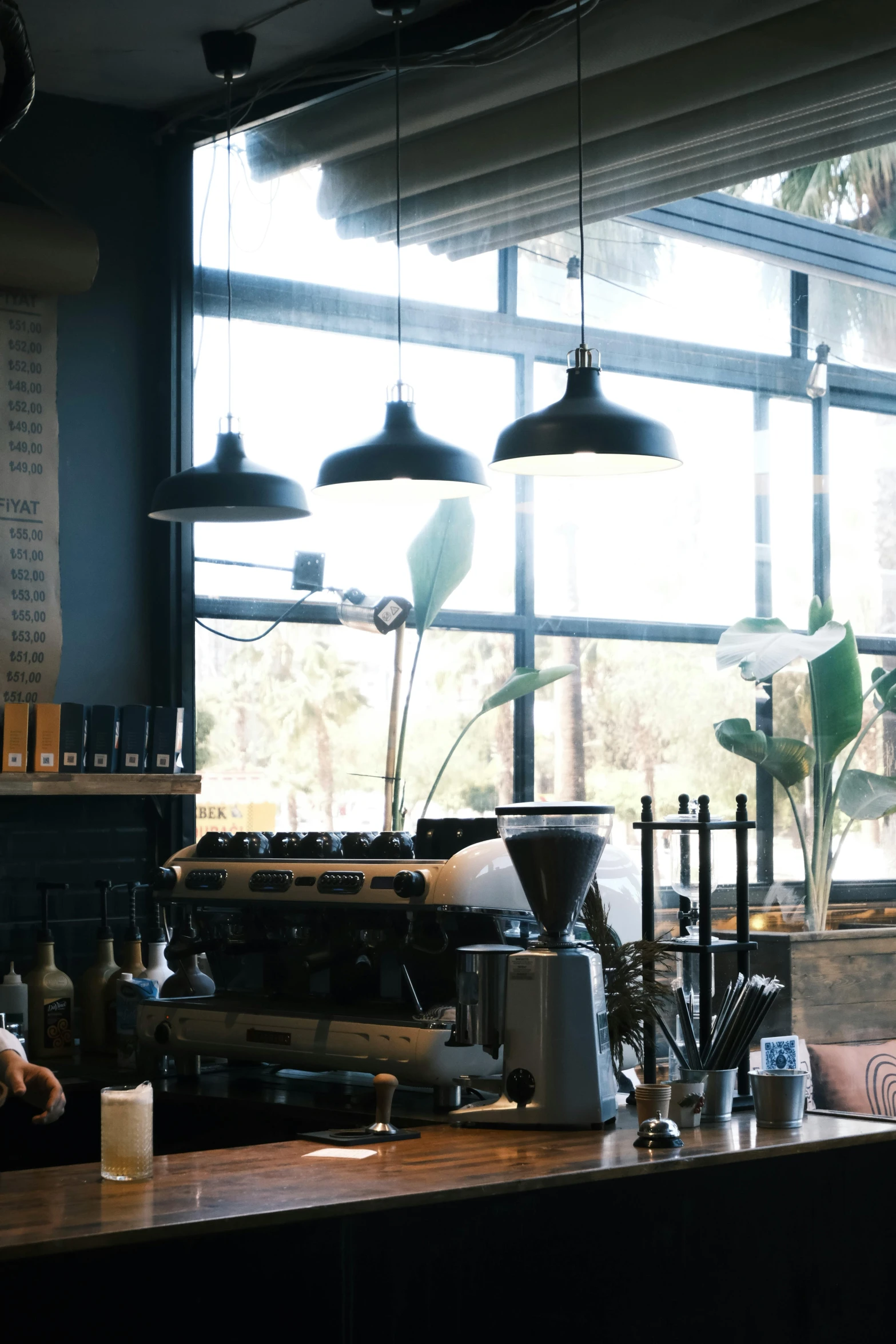 coffee shops are pictured in the window with their coffee