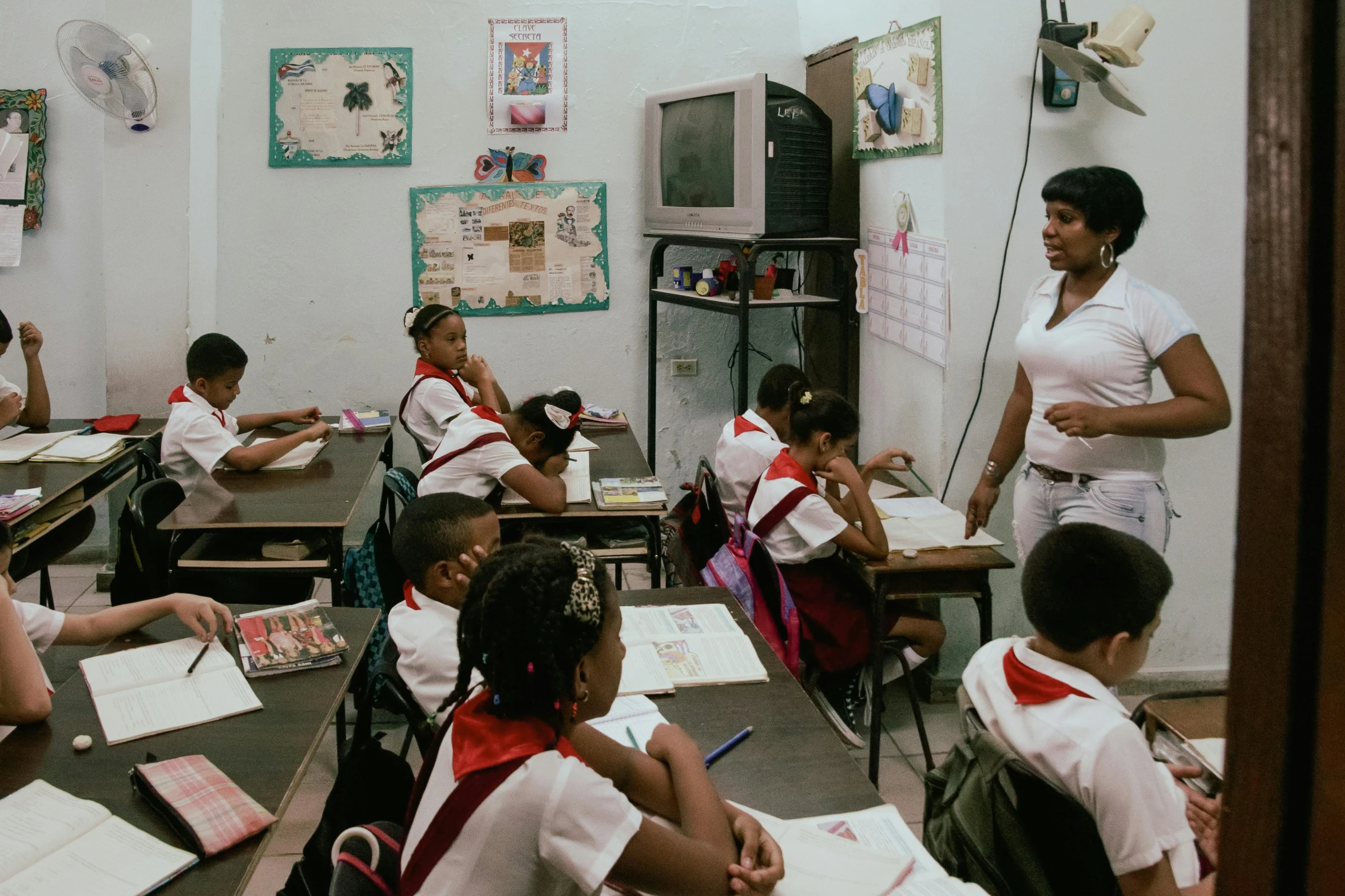 a classroom of a school with many students in it