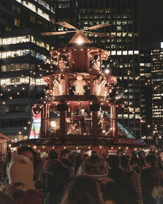 many people gather for an outdoor event in the city