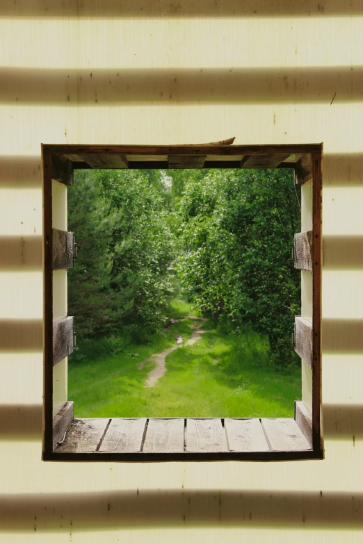 an open window on the outside of a building