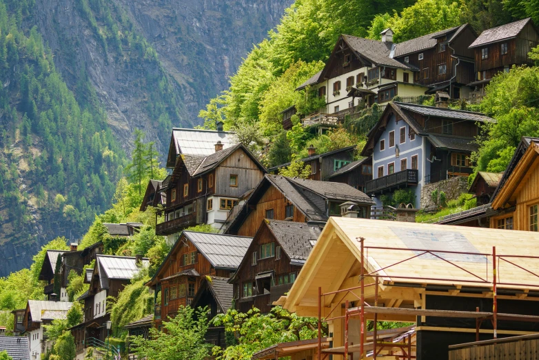 the wooden houses have been built on the hill side