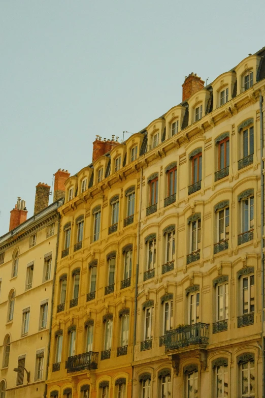 old buildings stand side by side on a street corner