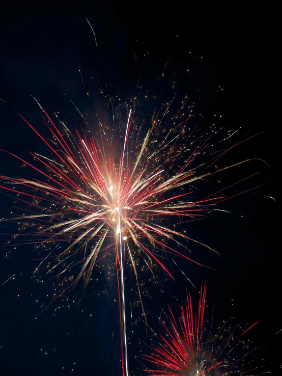 fireworks being lit during a party with very bright colors