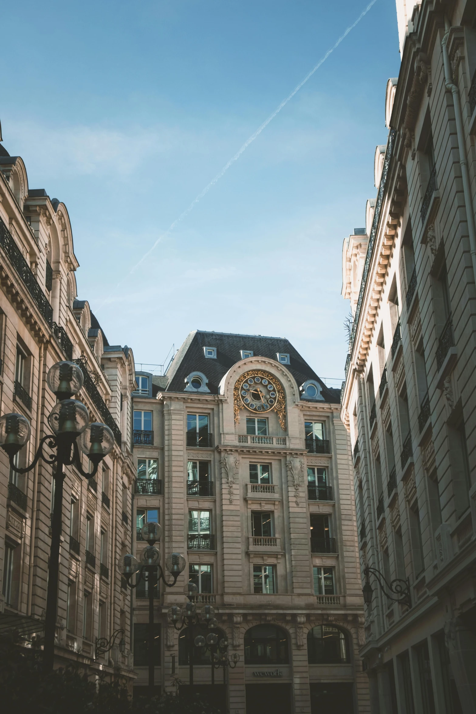 a very tall building surrounded by several other buildings