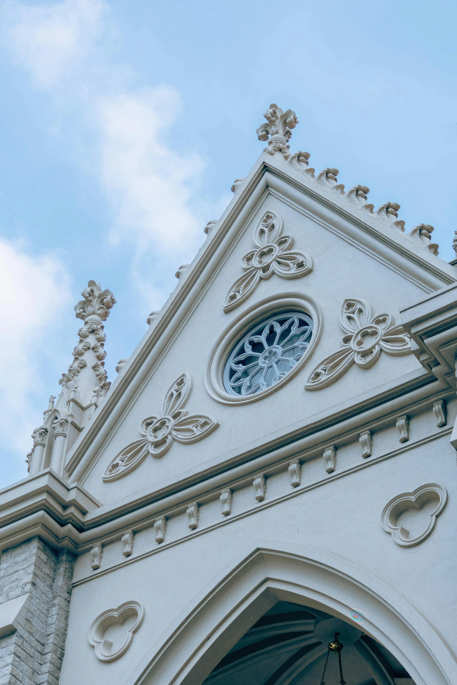 the ornate clock on the side of a church