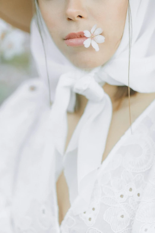 a close up of a person with flowers on her face