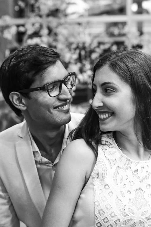 a man and woman sitting next to each other