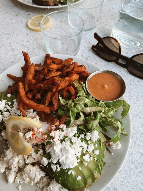 a white plate of food on top of a table