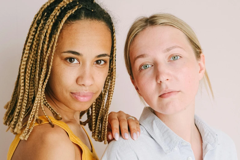 two young women looking at the camera