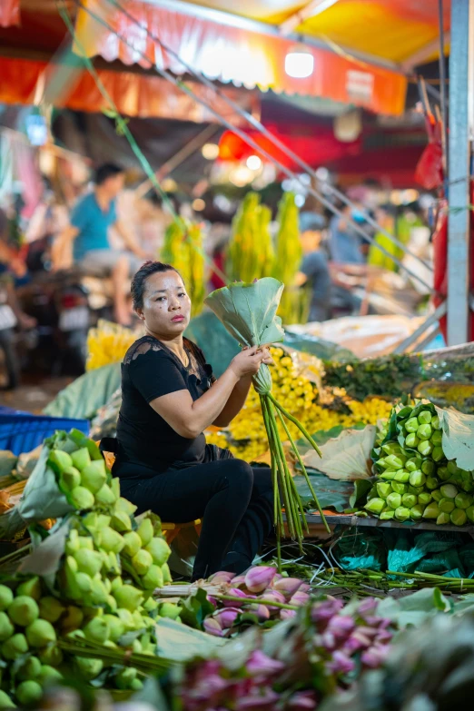 a man with a umbrella at a market