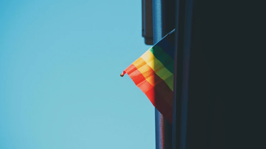 a small flag is in front of the sky