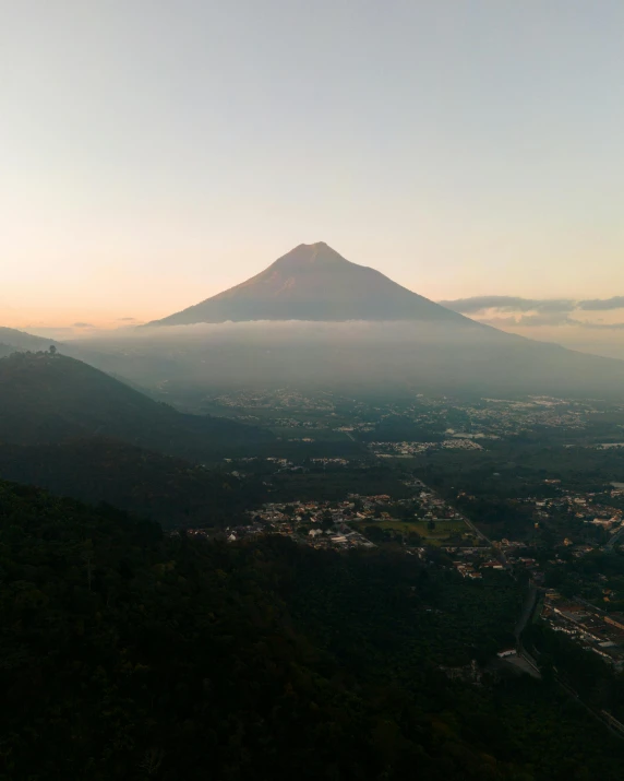 a bird's eye view of the city below mountain