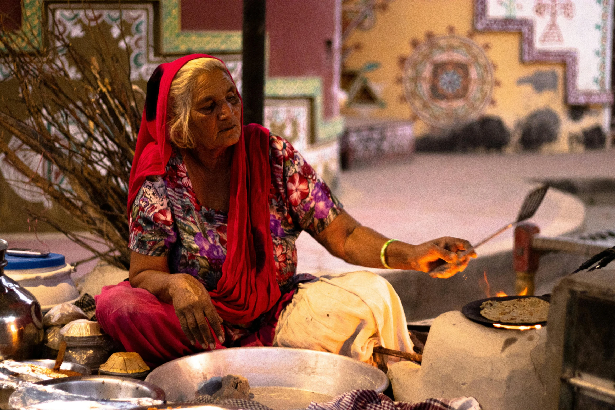 a woman sits down preparing some food