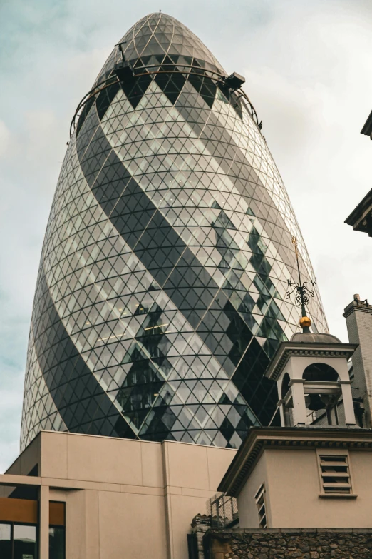 the building has a tall tower with many windows