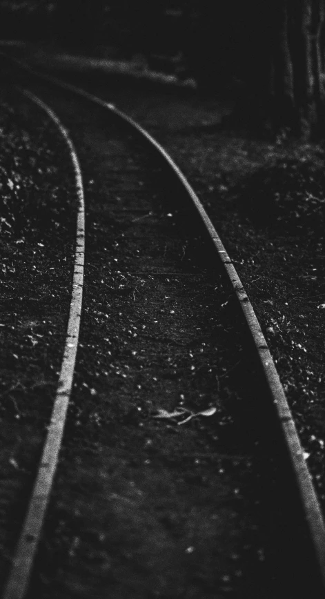 train tracks on the side of the road