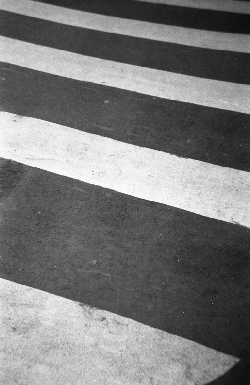 an old black and white po of a person riding a skateboard