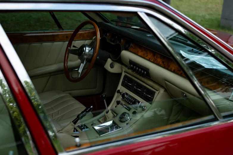 interior of an older, red sporty car