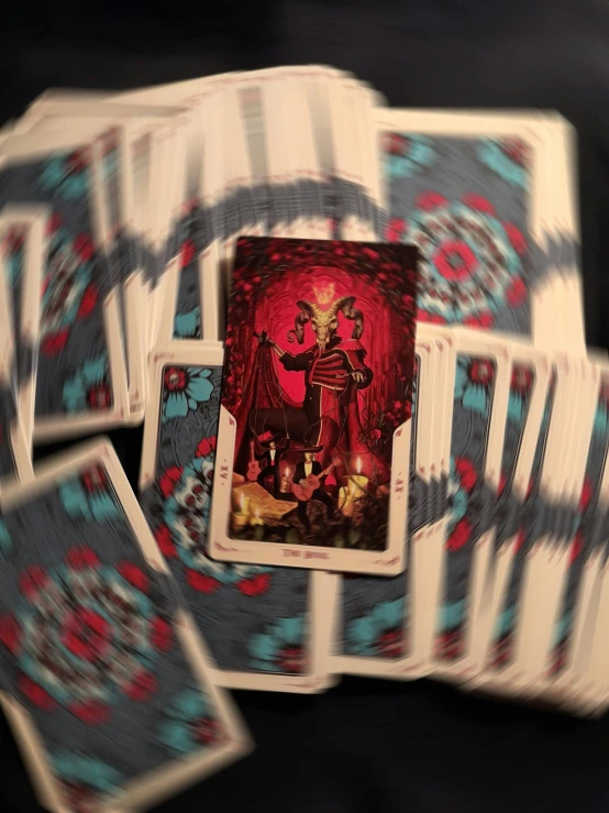 a card that is laying on top of some cards