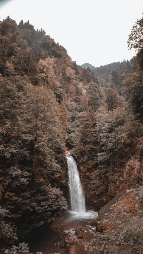 a view of an outflow of water from a waterfall