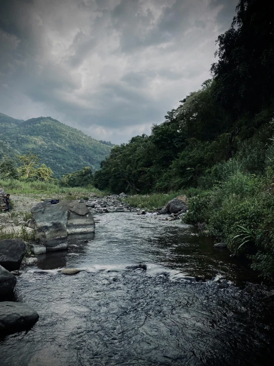 the water is rushing down the mountainside