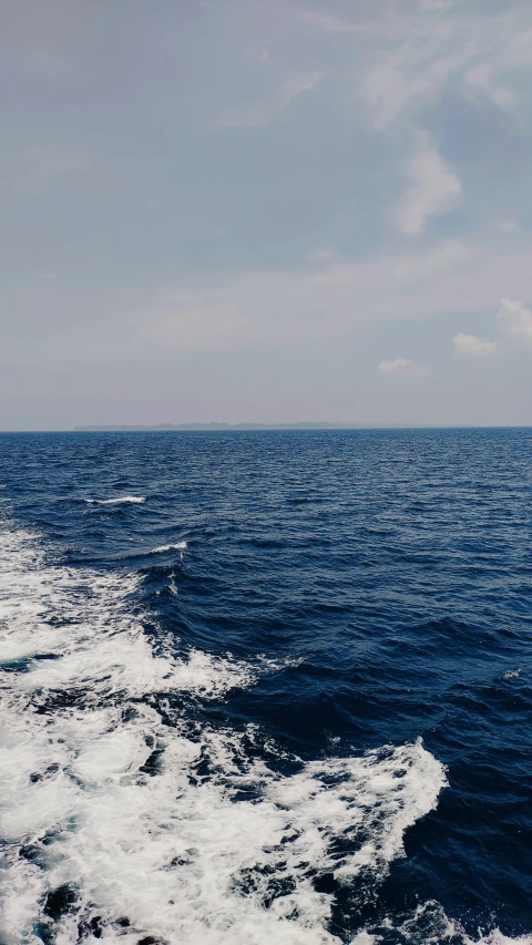 a large boat traveling across a body of water