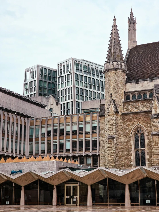 the buildings are tall and tan with many windows